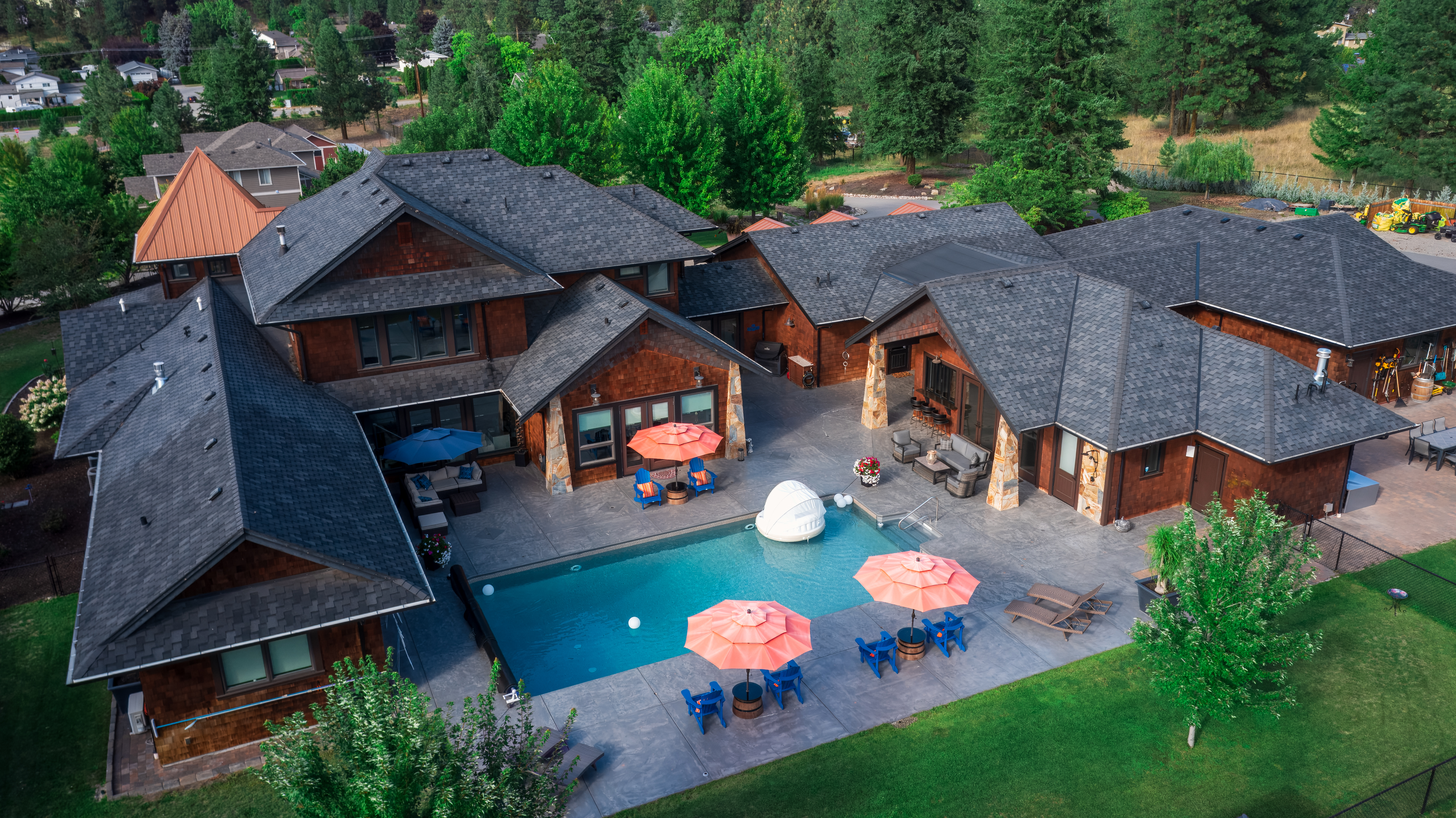 A high-angle aerial photo of a beautiful residential home